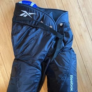 Reebok youth large hockey pants.